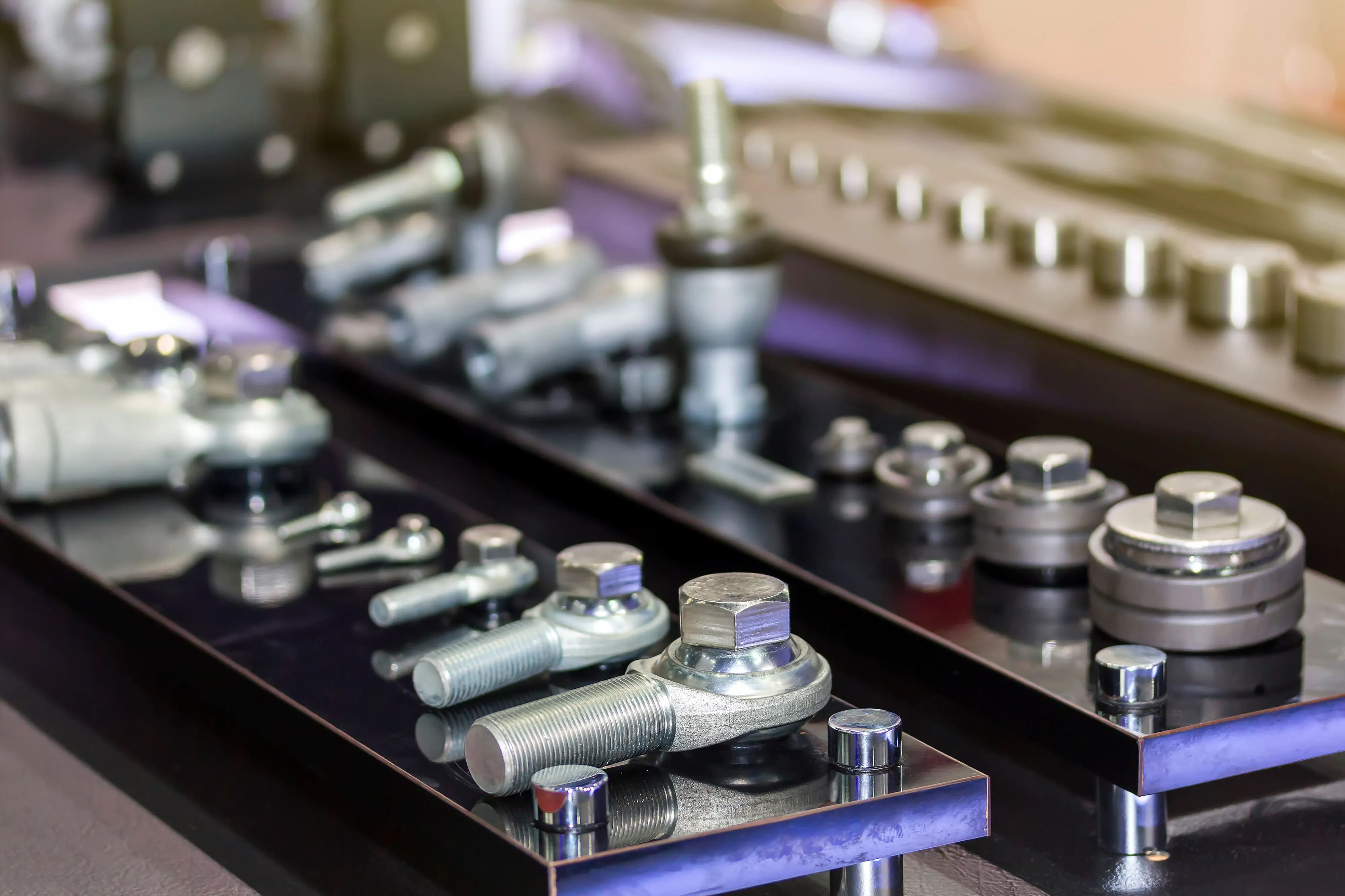 Precision machined metal hardware in an industrial workshop